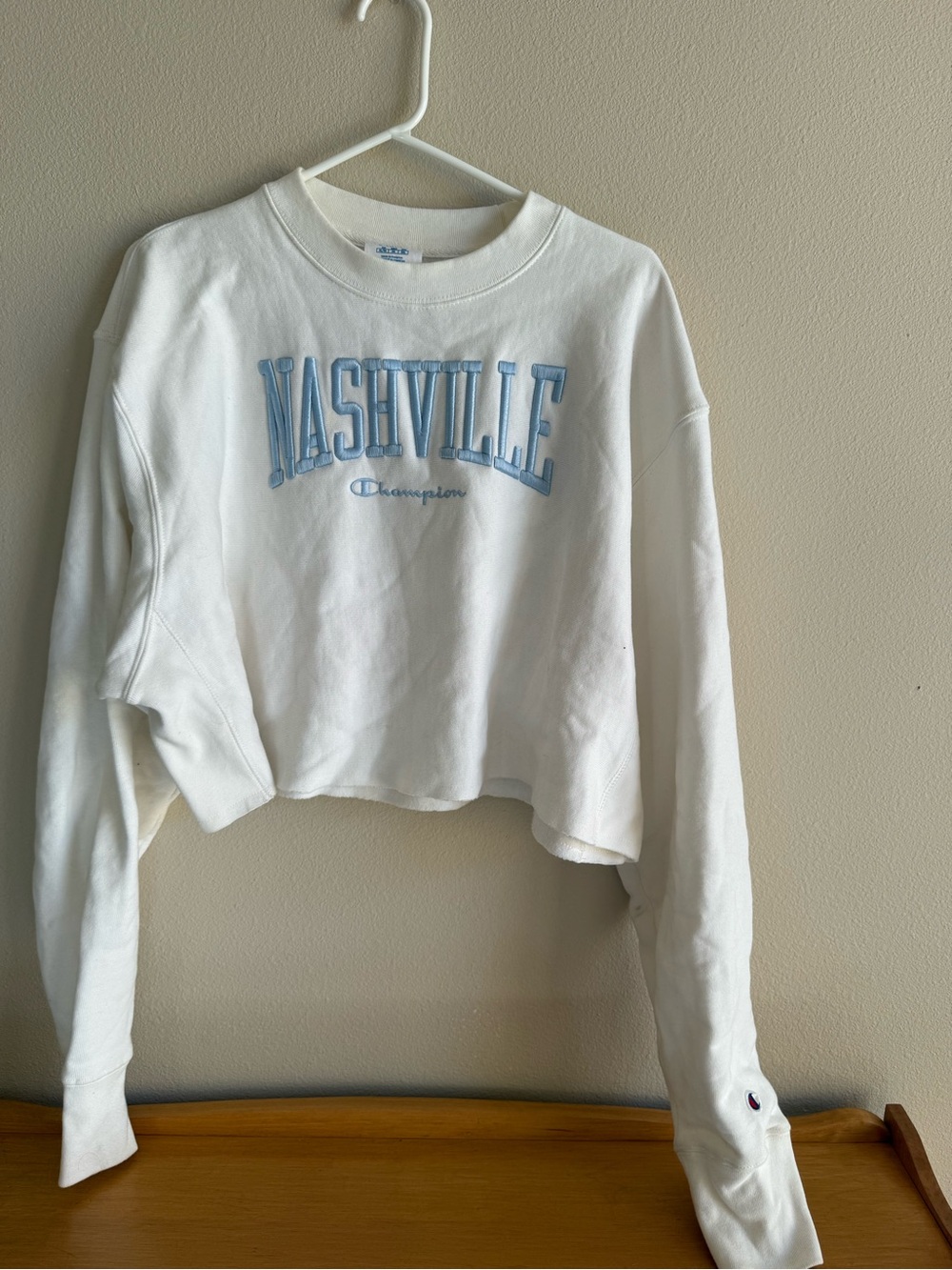 Champion Cream Cropped Sweatshirt with Light Blue Nashville Embroidery